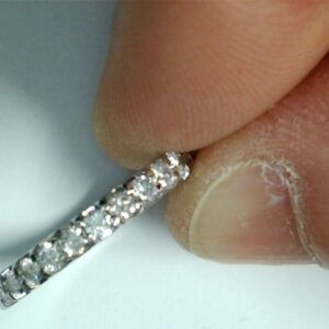 Elegant Shared Prong Diamond Band