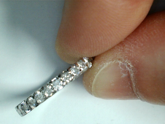 Elegant Shared Prong Diamond Band