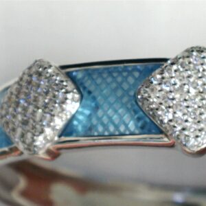 Azure Elegance: A Diamond & Custom-Cut Topaz Bangle